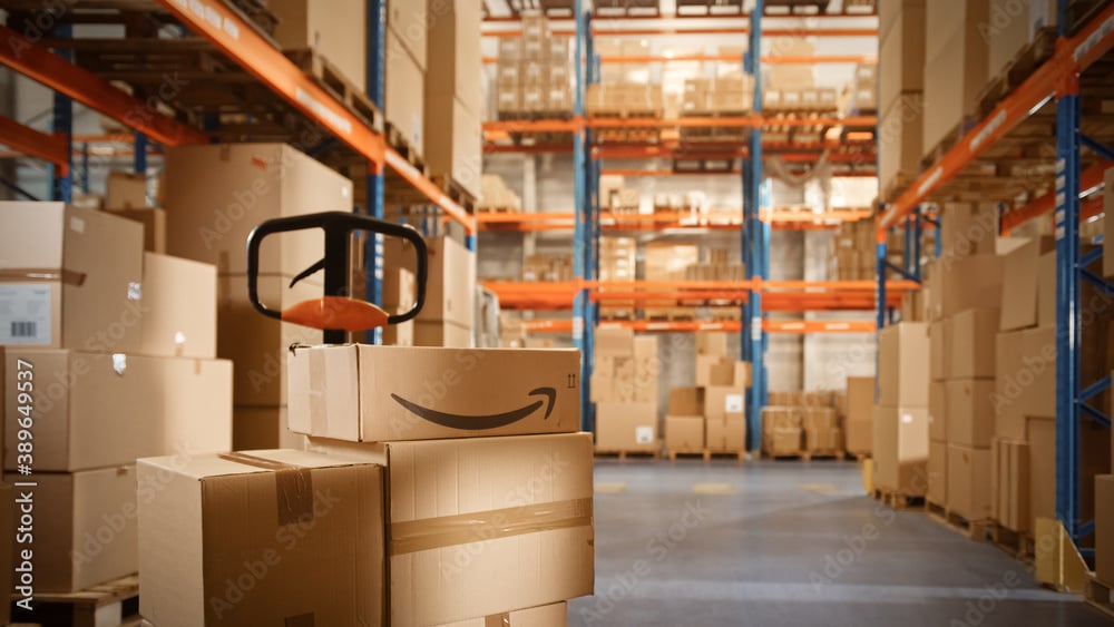 Amazon Boxes Stacked In Warehouse- Smart Warehousing